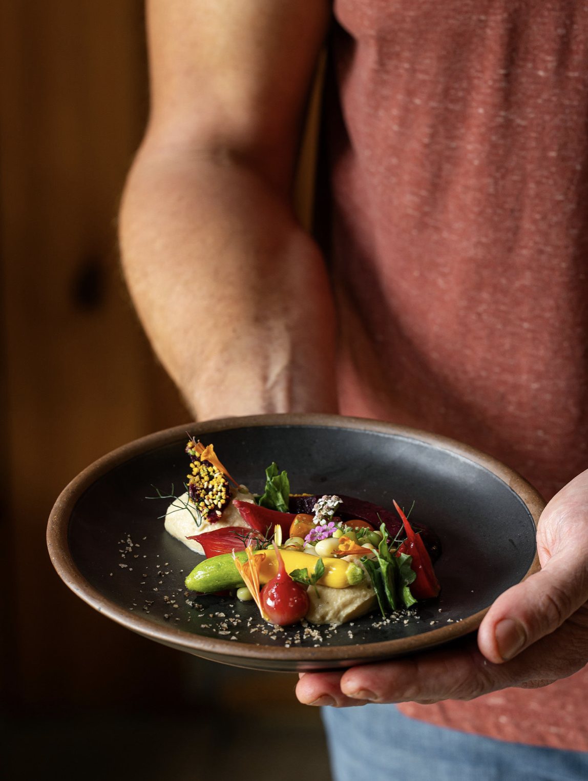 chef holding plate 1
